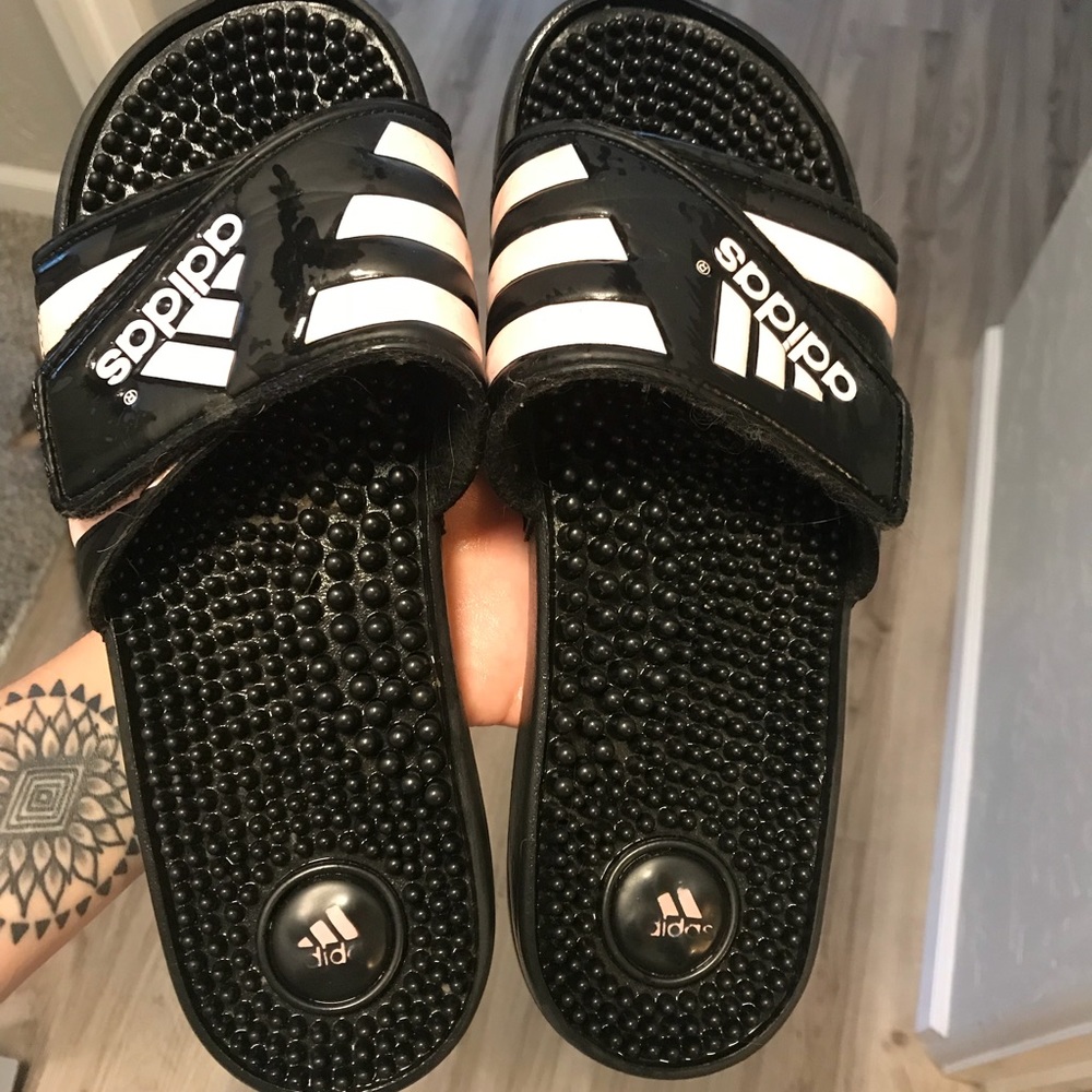 Black and pink adidas slides